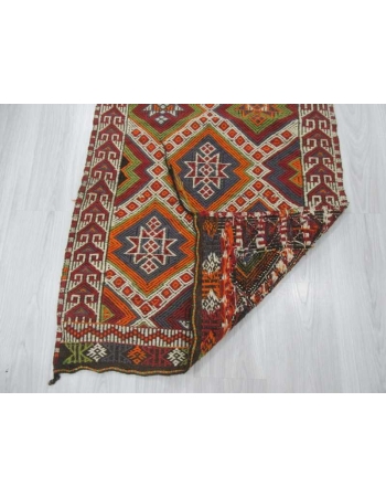Small Vintage embroidered kilim rug