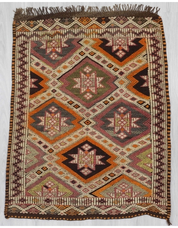 Embroidered small kilim rug