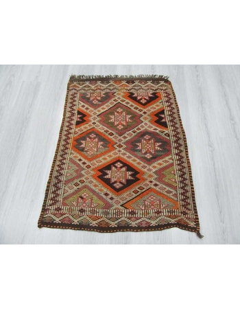 Embroidered small kilim rug