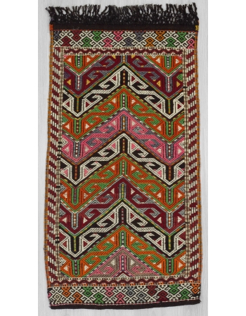 Vintage small embroidered kilim rug