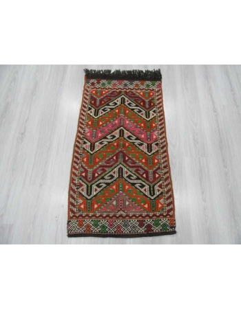 Vintage small embroidered kilim rug