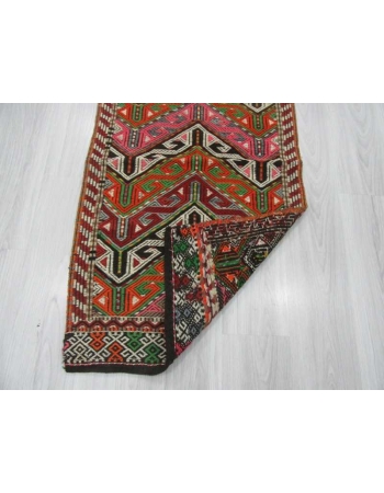 Vintage small embroidered kilim rug