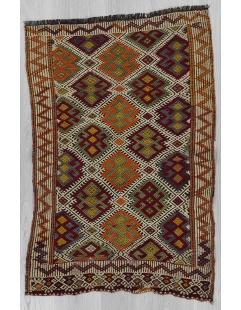 Embroidered vintage kilim rug