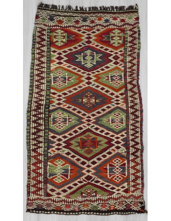 Embroidered vintage small kilim rug