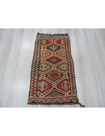 Embroidered vintage small kilim rug