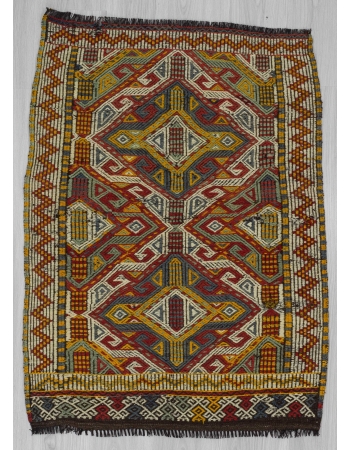 Small Vintage embroidered kilim rug