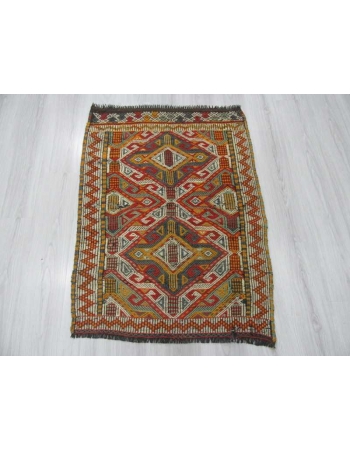 Small Vintage embroidered kilim rug