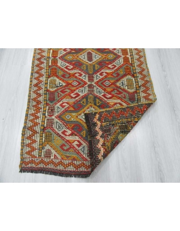 Small Vintage embroidered kilim rug