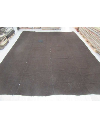 Dark brown vintage kilim rug