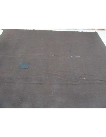 Dark brown vintage kilim rug