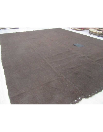 Dark brown vintage kilim rug