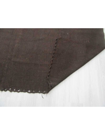 Dark brown vintage kilim rug