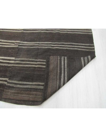 Vintage black kilim rug