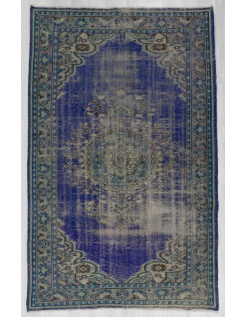 Vintage distressed Turkish area rug