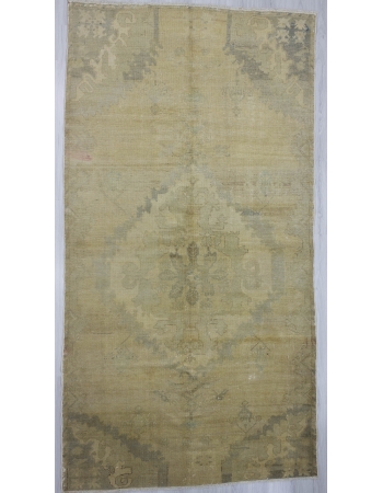 Washed out vintage Turkish Oushak rug