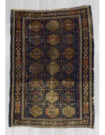 Distressed Antique Baluch Rug