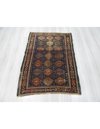 Distressed Antique Baluch Rug