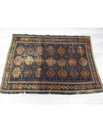 Distressed Antique Baluch Rug