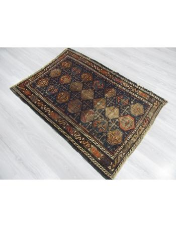 Distressed Antique Baluch Rug