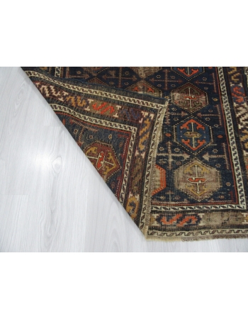 Distressed Antique Baluch Rug