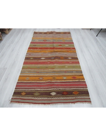 Embroidered colorful vintage kilim rug