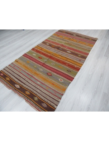 Embroidered colorful vintage kilim rug
