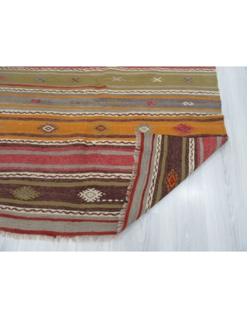 Embroidered colorful vintage kilim rug