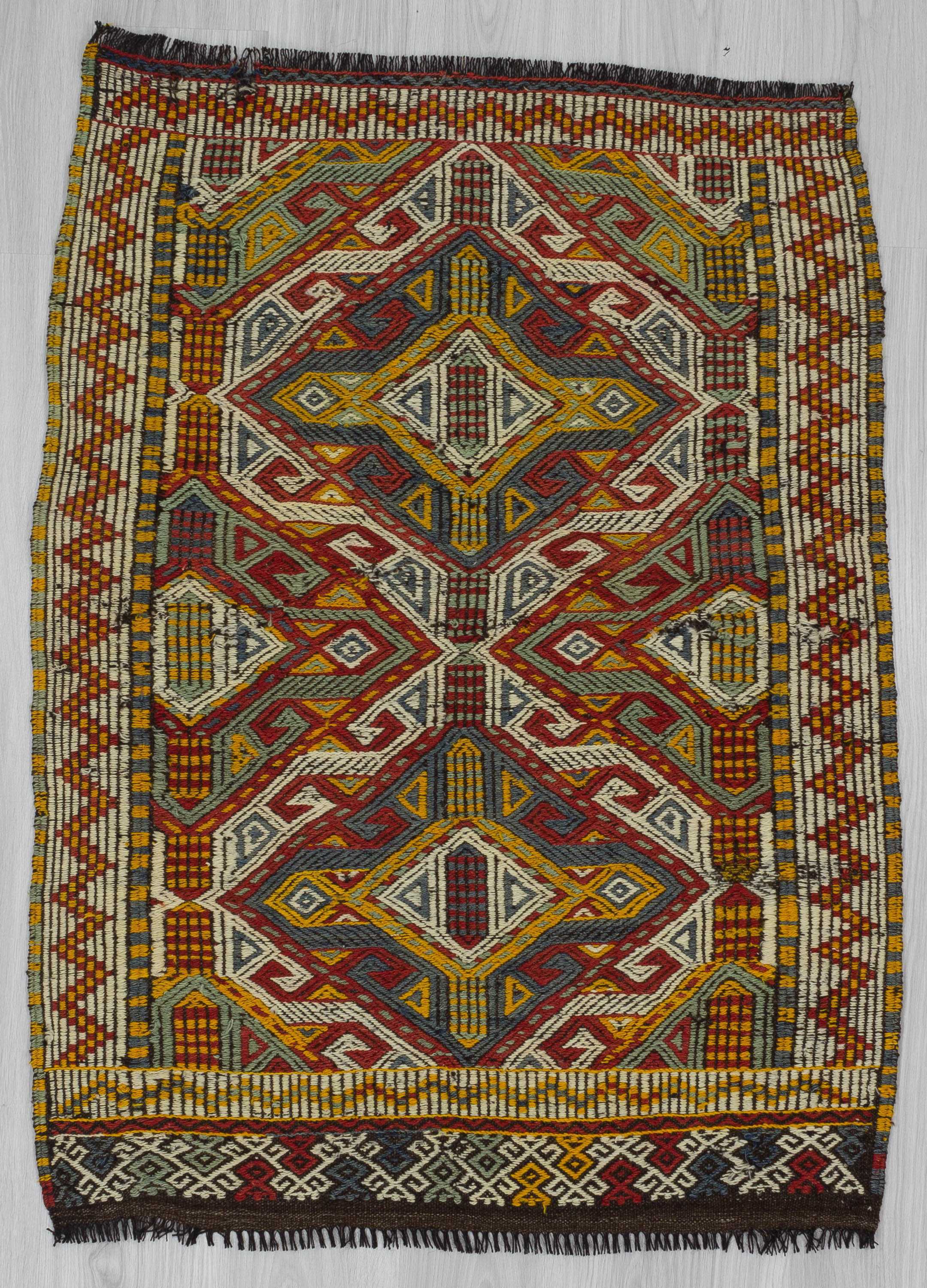 Small Vintage embroidered kilim rug